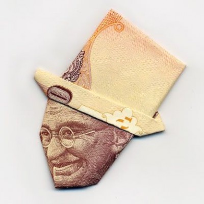 Gandhi with a british hat.jpeg