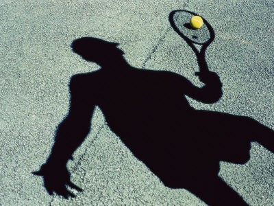shadow-of-a-male-tennis-player-playing-tennis.jpg